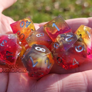 Sharp Edge Dice - Full Set with Inclusions - Torchlight Polyhedral Dice Set