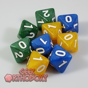 May include: A set of eight dice in blue, green, and yellow with white numbers. The dice are shaped like a pyramid with four sides.
