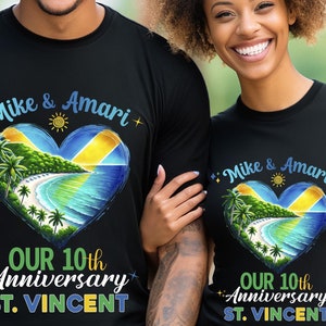 May include: A couple's matching black t-shirts with a heart design featuring a beach scene and the text "Mike & Amari" and "Our 10th Anniversary St. Vincent".