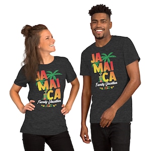 May include: Two people wearing dark grey t-shirts with a graphic design of palm trees and the word "Jamaica" in a colorful gradient. The text "Family Vacation 2022" is below the graphic.