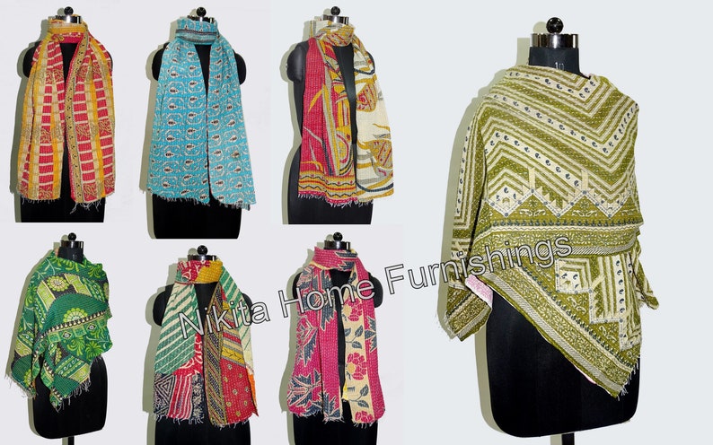 May include: A collection of colourful kantha quilts, each with a unique pattern and design. The quilts are made from recycled saris and are perfect for adding a touch of bohemian style to any home.