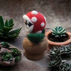 Needle felted piranha plant