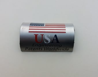 May include: A silver metal label with a red, white, and blue American flag and the text "USA Engineering Patents Worldwide".