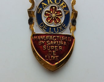 Begagnad SAKURA SUPER DELUXE aluminiumpräglad huvudbricka för vintagecykel