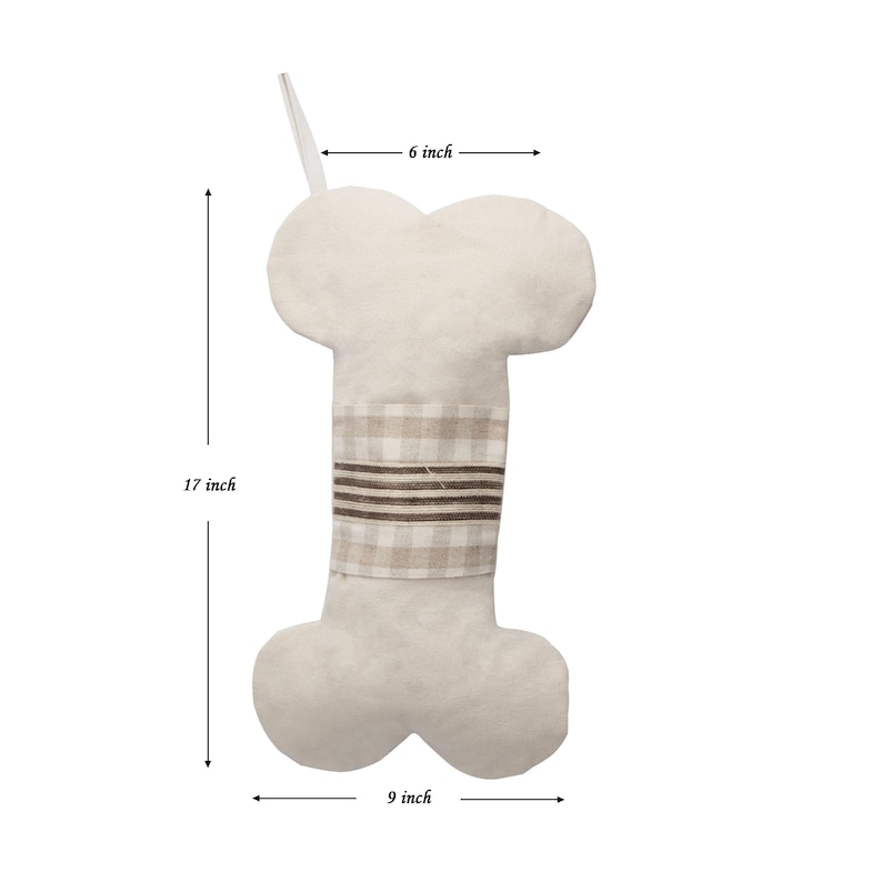 May include: A beige bone-shaped stocking with a brown and beige plaid band. The stocking is 17 inches tall, 6 inches wide at the top, and 9 inches wide at the bottom.