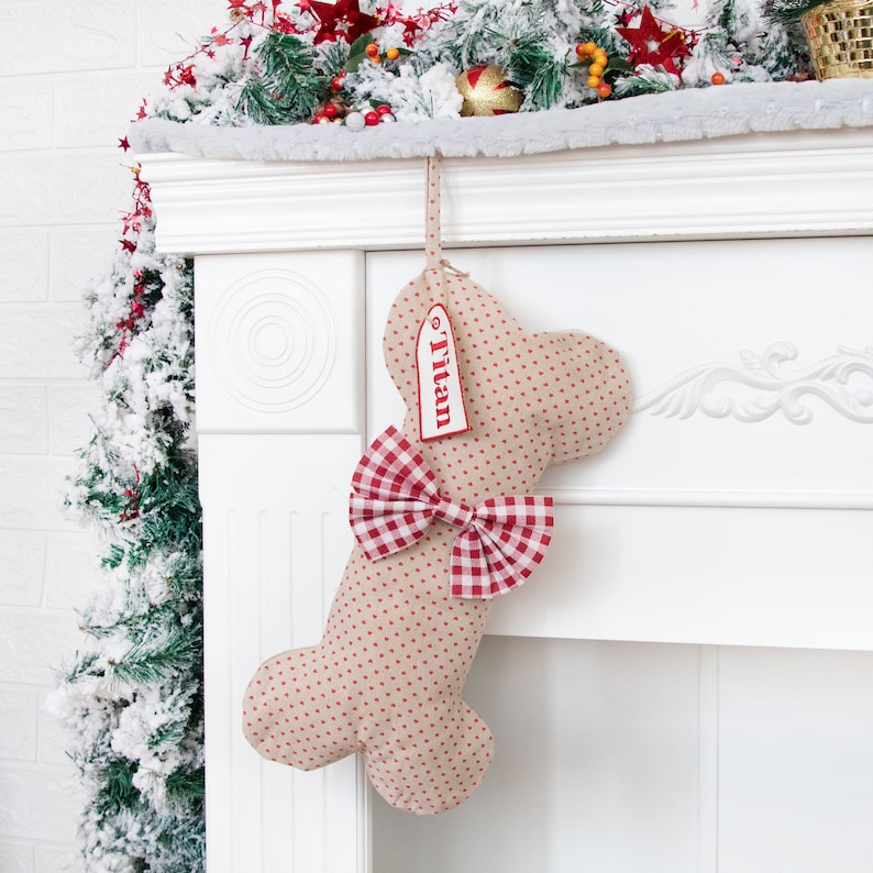A product display image of a personalized pet stocking with a small heart pattern