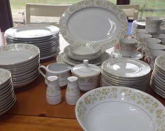 Fine China Dinnerware  by Royal Wentworth in the Caroline pattern #8702 rimmed in Gold service 12 11 bowls 91 pieces