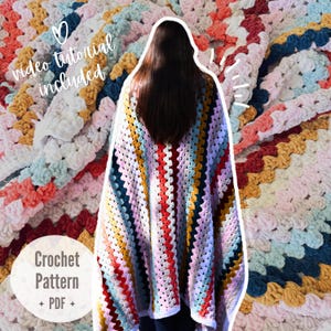 May include: A multi-colored crochet blanket featuring a striped pattern in shades of pink, yellow, blue, red, and white. The image includes text that reads video tutorial included and Crochet Pattern PDF, indicating a digital instructional guide.