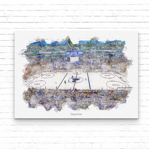 May include: A watercolor painting of an ice hockey arena, Enterprise Center, with a blue and white ice rink and a crowd of spectators in the stands.
