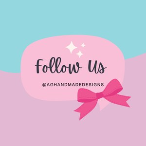 May include: Pink speech bubble with the text "Follow Us" and the username "@AGHANDMADEDESIGNS" in black text. A pink bow is attached to the bottom of the speech bubble.