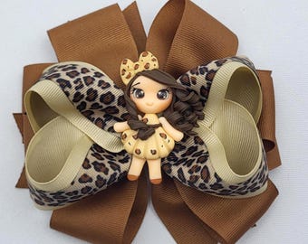 Leopard Print Hair Bow with Clay Doll | 5 Inch Boutique Bow | Animal Print Girls Hair Bow | Limited Edition Fall Hair Accessory