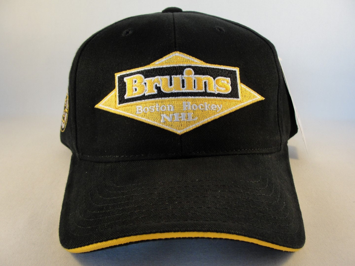 BOSTON BRUINS VINTAGE 90s TWINS NHL HOCKEY STRAPBACK HAT – The