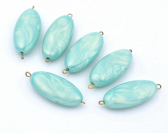 Set of 10 pearlescent oval pearlescent flat pearls in acrylic 33x15x7mm - turquoise