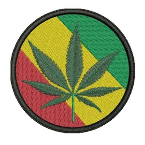 May include: Embroidered patch featuring a green cannabis leaf on a background of red, yellow, and green, within a black circular border. The design is reminiscent of the Rastafarian flag, with a detailed, textured appearance.