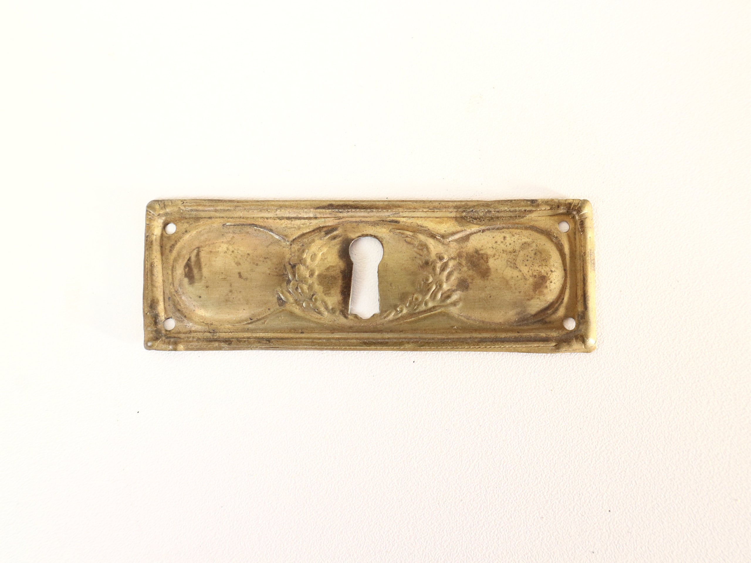 One Antique ornate brass keyhole cover, plate. Ornamental escutcheon, cabinet hardware, furniture applique, Key plate