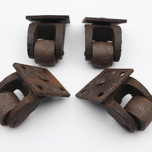 Set of Four (4) Antique /  vintage industrial castors, with metal wheels