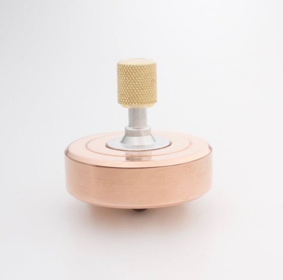 Longest on sale spinning top