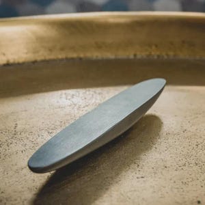 Stone Rattleback 10cm Steel Rattleback - Physics Toy, Wobble/celtic Stone - Etsy