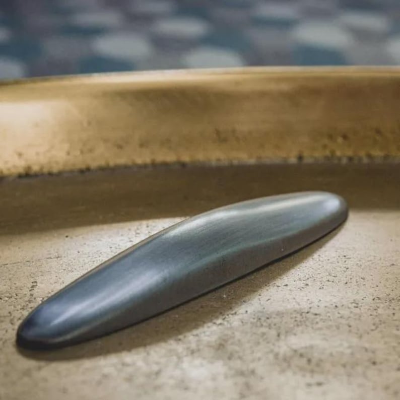 Stone Rattleback 10cm Steel Rattleback - Physics Toy, Wobble/celtic Stone - Etsy