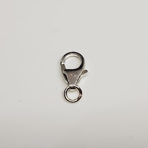 Charm lobster clasp with jump ring for hanging, also as a lobster clasp for necklaces, bracelets etc. 2 sizes: Without eyelet approx. 10 mm and 12 mm