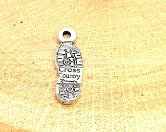 Cross country shoe print charm