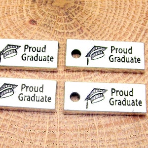 Proud graduate charms  lot of 4 graduation charms