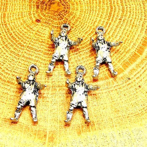 lot of 4 Wrestler charms