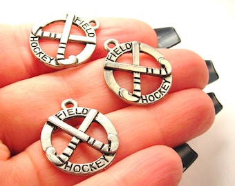 Dijes de palos de hockey cruzados, 3 piezas