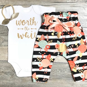 Worth The Wait Newborn / Coming Home Outfit Baby Girl Gold Glitter Bodysuit Black Striped High Waisted Floral Pants Bow / Headband image 1