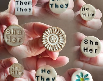 Handmade pottery pronoun and flower badges, rustic and quirky