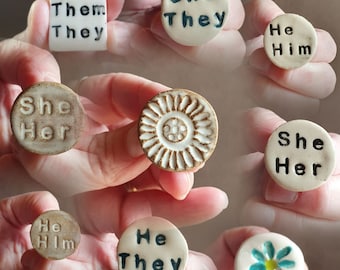 Handmade pottery pronoun and flower badges