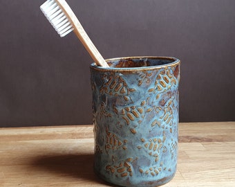 Handmade pottery toothbrush holder with sea turtle pattern - two design variations