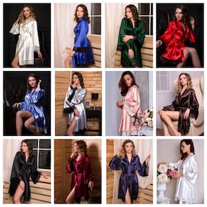 May include: A collection of 12 satin robes in various colours, featuring lace trim on the sleeves and neckline. The robes are shown on models in a variety of poses.