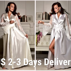 May include: White satin robe with long sleeves and lace detailing. The robe has a sash tie at the waist and a front slit. US 2-3 Days Delivery.
