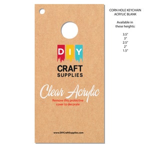 May include: A clear acrylic corn hole keychain blank on a brown tag. The tag has a hole at the top and text that reads "DIY CRAFT SUPPLIES" and "Clear Acrylic". Available in heights from 1.5" to 3.5".