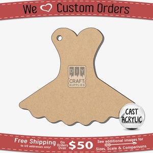 May include: A brown wooden dress shape cutout with a hole at the top. The cutout is for crafting and is available in various sizes. The image includes the text "DIY CRAFT SUPPLIES" and "CAST ACRYLIC".