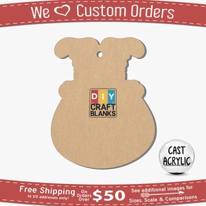 May include: A brown wooden cutout of a snowman with a hat and scarf. The cutout is blank and ready to be painted or decorated. The cutout is labeled "DIY CRAFT BLANKS".