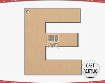 May include: A brown wooden letter E with a hole at the top. The letter is cut out from a sheet of wood and has a rough, unfinished texture. The letter is surrounded by a white background.