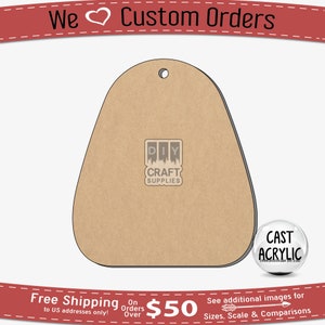 May include: A brown, teardrop-shaped, wooden ornament with a hole at the top for hanging. The ornament is blank and ready to be painted or decorated. The ornament is made by DIY Craft Supplies.
