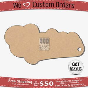 May include: A brown wooden cloud-shaped tag with a hole for hanging. The tag is blank and ready for personalization. The tag is surrounded by a white background.