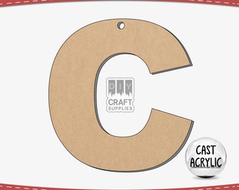 May include: A brown wooden letter C cutout, approximately 30 cm tall, with a hole at the top for hanging. The letter is made of unfinished wood and is ready to be painted or stained. The letter is perfect for crafting projects, home decor, or gifts.