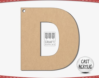 May include: A brown wooden letter D with a hole at the top for hanging. The letter is made of unfinished wood and is ready to be painted or stained. The letter is 30.5 cm tall and is perfect for crafting projects.