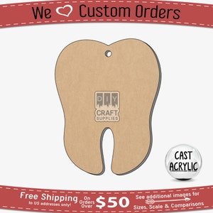 May include: A brown wooden tooth-shaped cutout with a hole at the top for hanging. The cutout is for crafting and is available from DIY Craft Supplies.
