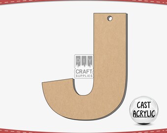 May include: A brown cardboard letter J with a hole at the top. The letter is cut out and ready to be used for crafting projects. The letter is on a white background.