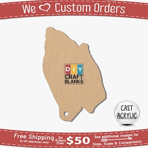 May include: A brown wooden cutout of a hand shape with a hole at the bottom. The cutout has a sticker on it that says "DIY CRAFT BLANKS". The sticker has a red, yellow, and blue background. There is a white orb with the text "CAST ACRYLIC" on it.
