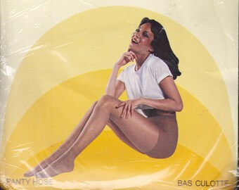 Secret - Vintage Pantyhose and Package - Happy Model displaying Pantyhose