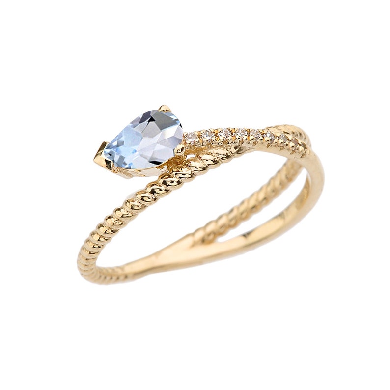 YELLOW GOLD CRISS-Cross Aquamarine Rope And Diamonds Designer Ring
