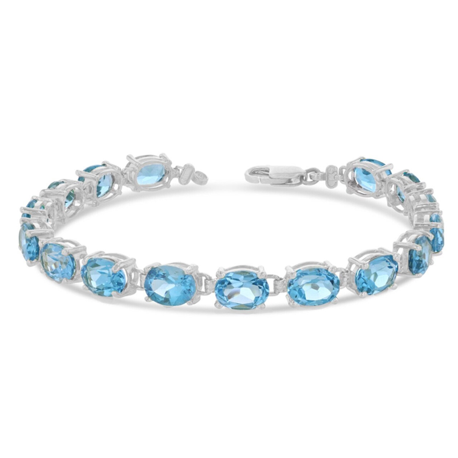 Oval Genuine Blue Topaz 8 X 6 Tennis Bracelet In White Gold Etsy