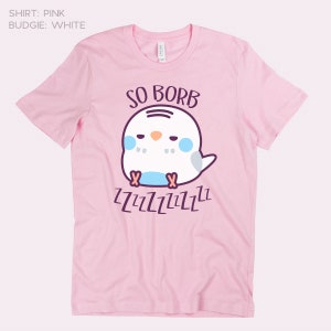 May include: Pink t-shirt featuring a white budgie cartoon illustration with the text "SO BORB" and "ZZZZZZZZZZ" printed on it.