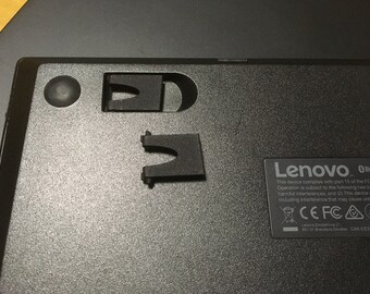 A pair of 3d printed Legs for ThinkPad TrackPoint Keyboard KU-1255, KT-1255, and Keyboard II